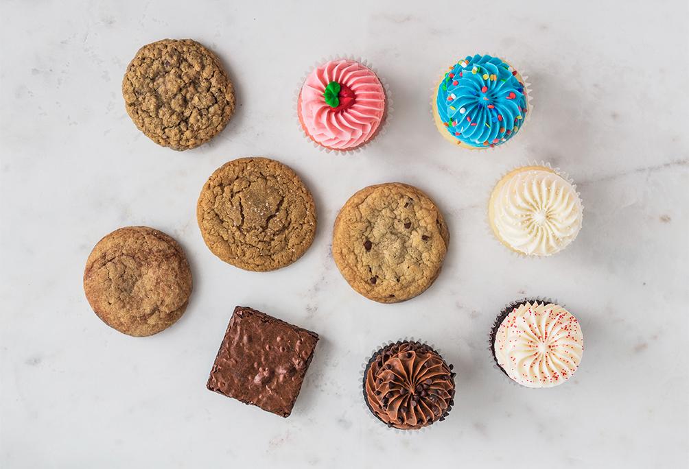 Blue Celebration, Best Sellers, Cookies, Brownies, Small Party Pack, All The Goodies, Cupcakes, Gigi's Cupcakes, Enjoy Anywhere, Anytime, Anyplace