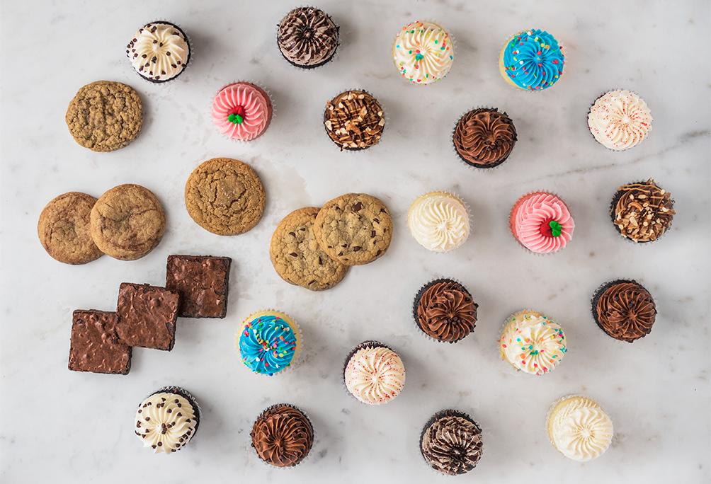 Blue Celebration, Best Sellers, Chocolate Addicts, Large Party Packs, All The Goodies, Cupcakes, Gigi's Cupcakes, Enjoy Anywhere, Anytime, Anyplace